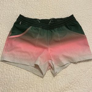 Womens Columbia PFG shorts. Multi color pink, grey and green. Size small.